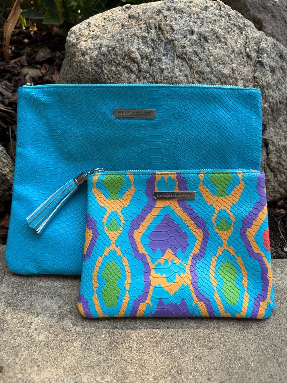 Rodan + Fields Turquoise & Multicolor Snake-Embossed Pouch Set